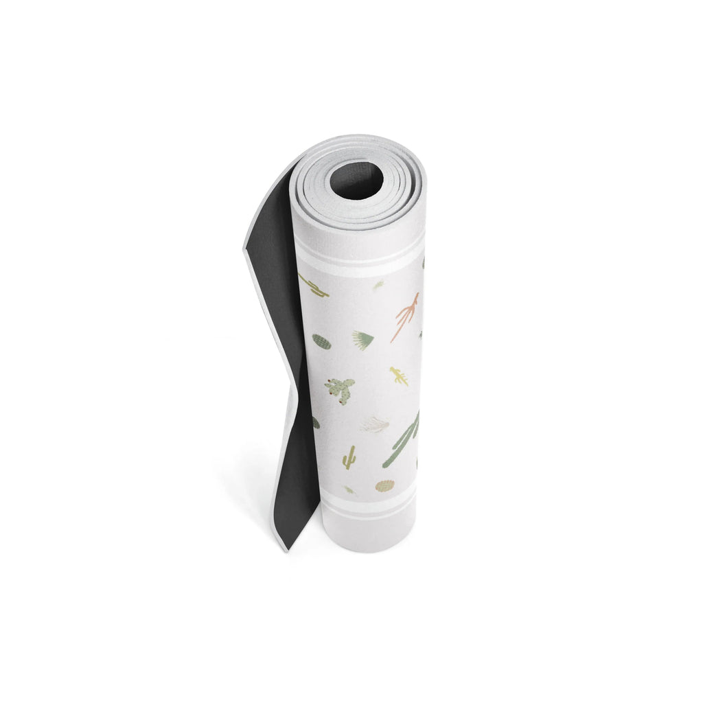 Crisp white Juno yoga mat rolled up, showing 6mm thick eco-friendly non-slip PER texture. — view 5