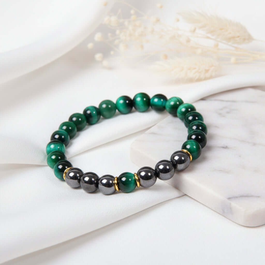 Men's tiger eye energy bracelet with natural golden-brown stones and sleek black gallstone accents. — view 3