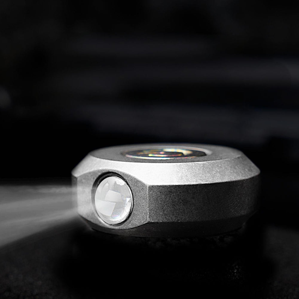 Compact titanium alloy EDC keychain flashlight with dual LED lights and sleek minimalist design