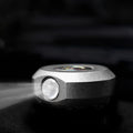 Compact titanium alloy EDC keychain flashlight with dual LED lights and sleek minimalist design