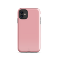 Bubblegum pink iPhone case with a durable dual-layer polycarbonate protective shell and shock-absorbing inner liner