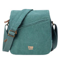 Stonewashed canvas flap crossbody bag with genuine leather trimmings and adjustable padded shoulder strap.