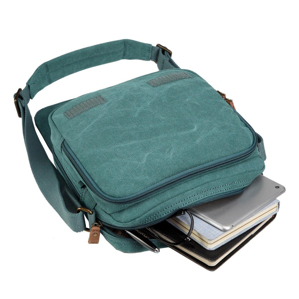 Stonewashed canvas flap crossbody bag with genuine leather trimmings and adjustable padded shoulder strap. — view 3