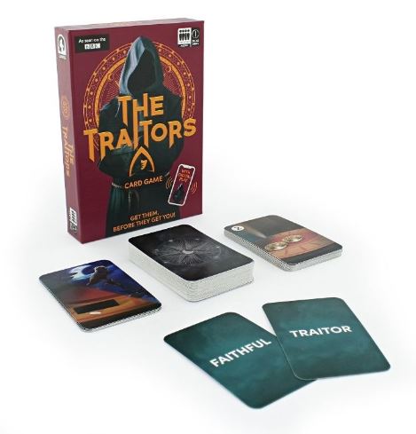 BBC The Traitors official card game box and playing cards laid out for tabletop play — view 4