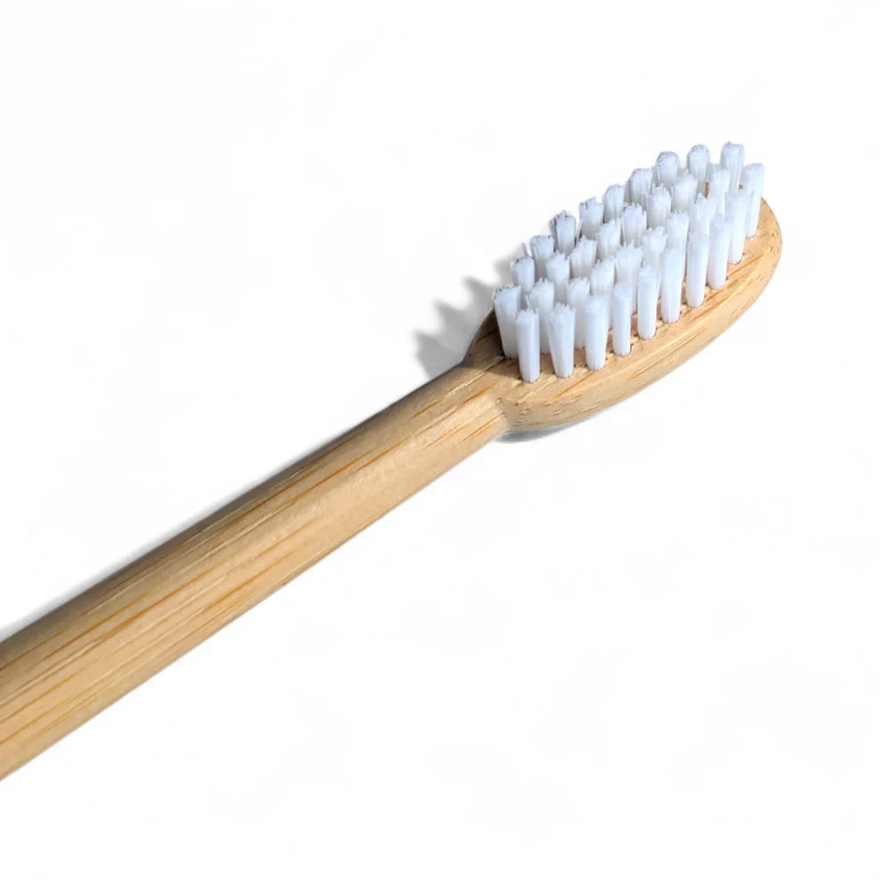 Sustainable bamboo toothbrushes with medium bristles, featuring yellow and turquoise painted tips — view 5