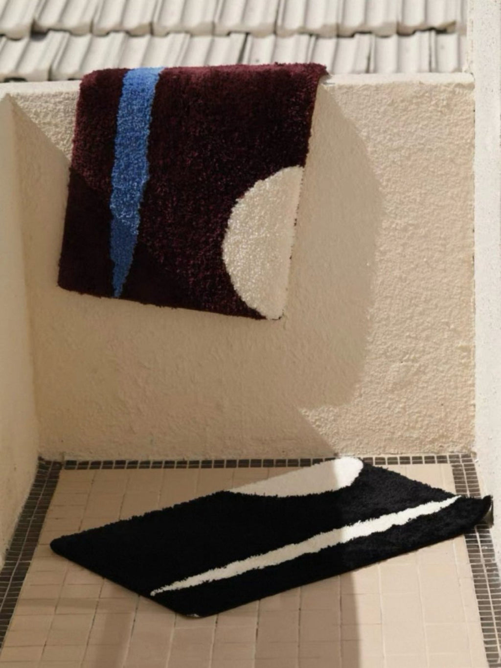 Ultra soft contemporary abstract bath rug in earthy tones with anti-slip backing on a bathroom floor — view 2