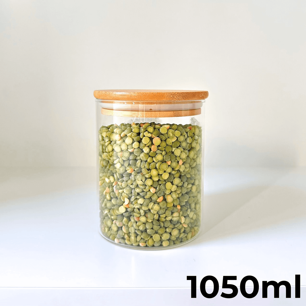 1050ml round clear glass storage jar with a natural airtight bamboo lid filled with dry ingredients — view 3