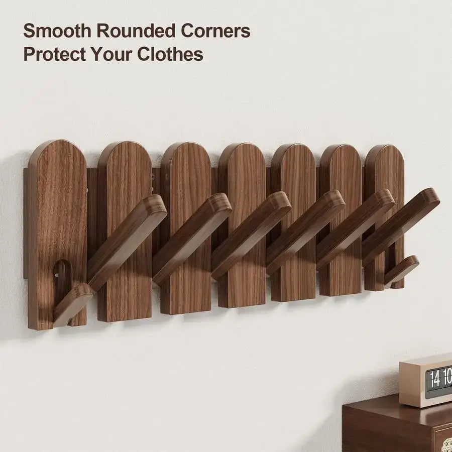 Solid walnut wood wall-mounted coat rack featuring eight retractable hooks in a modern piano key design — view 5