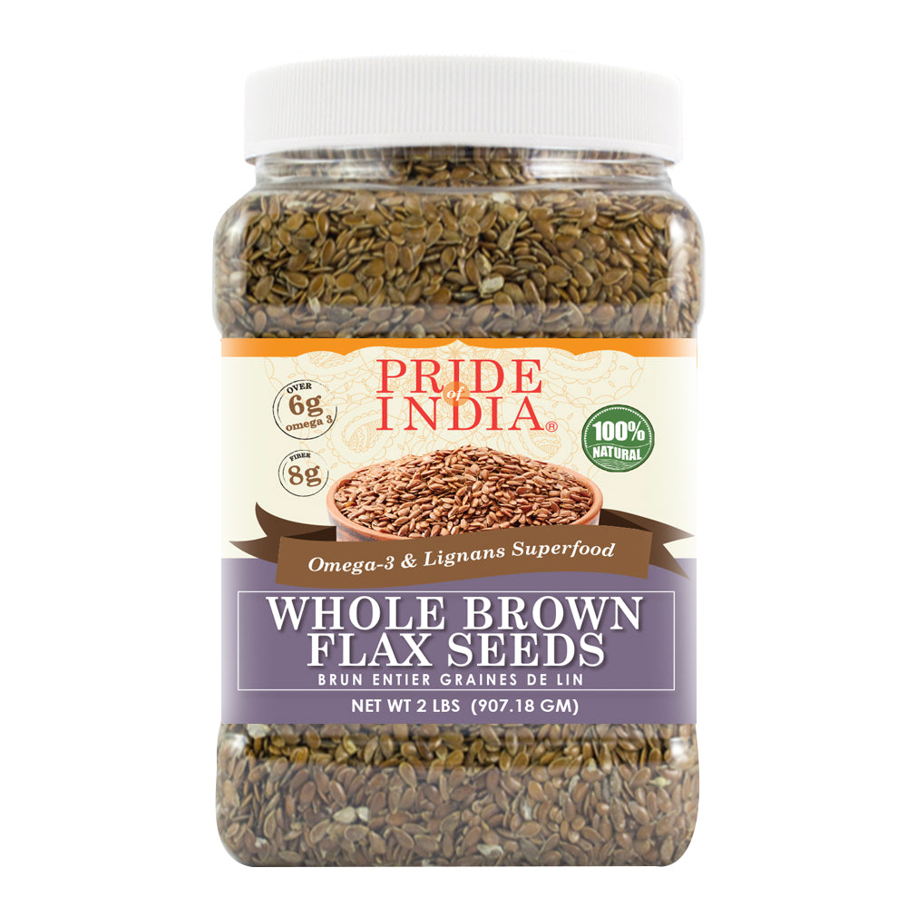 Whole brown flax seeds in a clear premium food storage jar with label — view 3