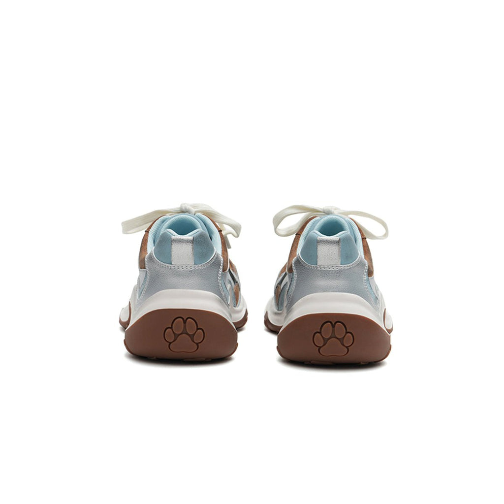 Women's chunky dad sneakers with metallic overlays, platform sole, and kawaii paw print heel detailing. — view 4