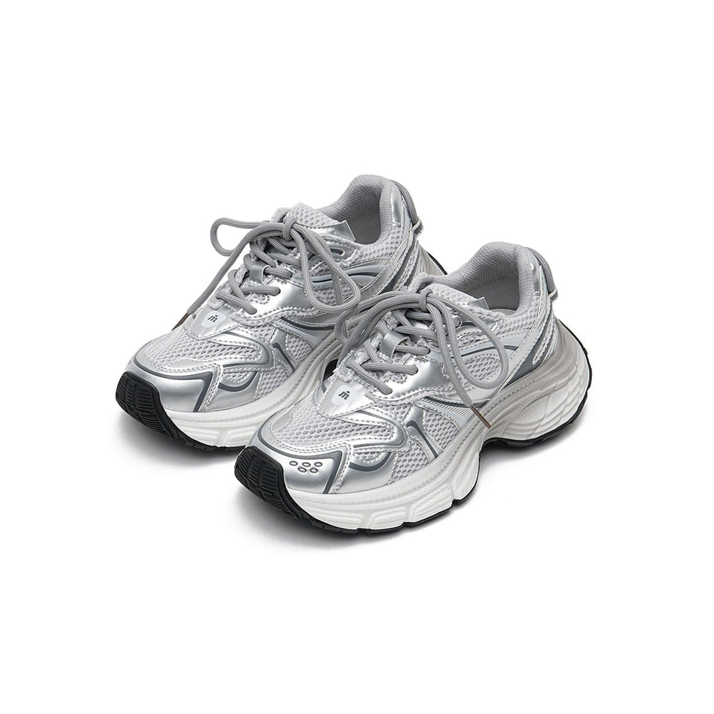 Women's chunky running shoes in metallic silver mesh with thick sculpted soles and curved lines — view 2