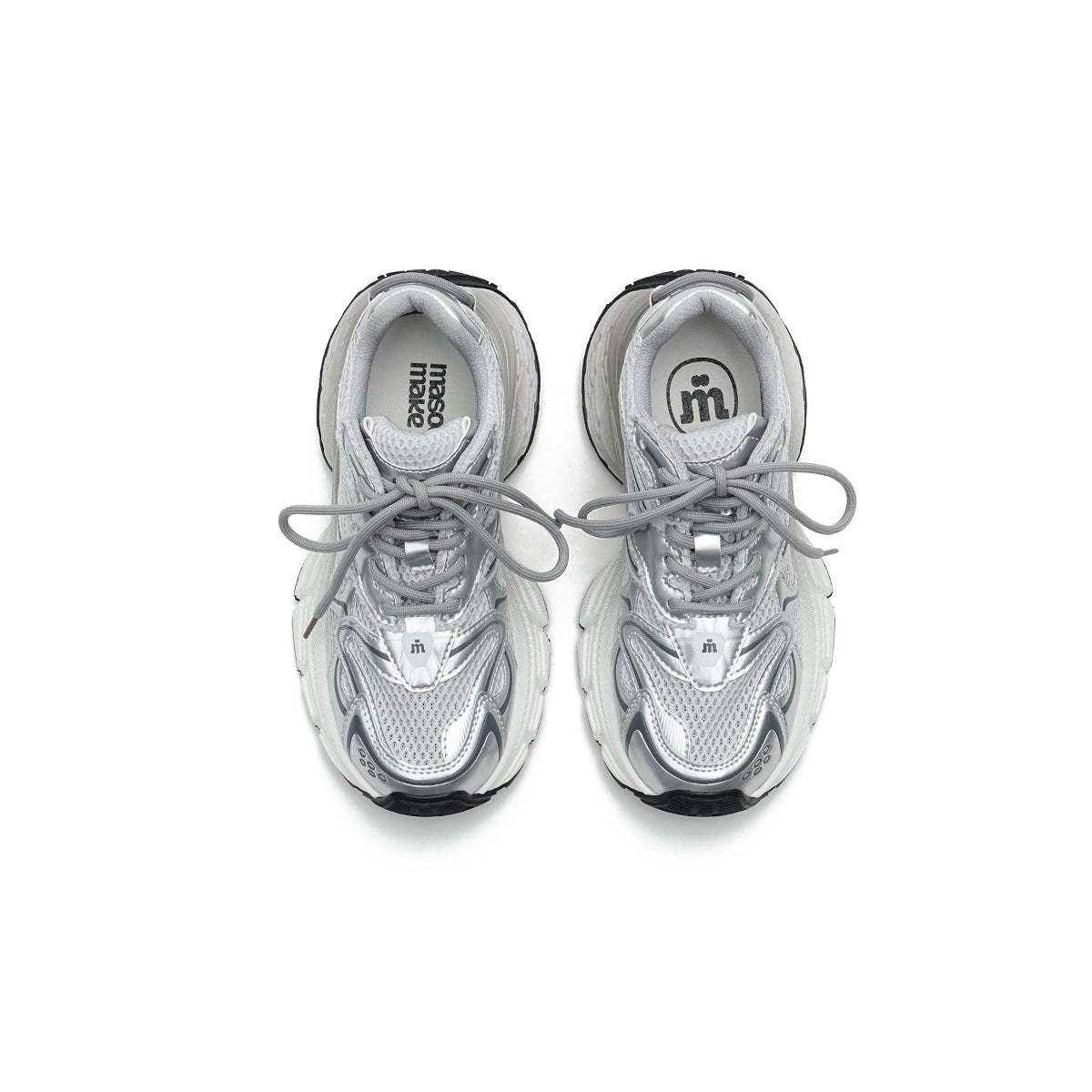 Women's chunky running shoes in metallic silver mesh with thick sculpted soles and curved lines — view 3