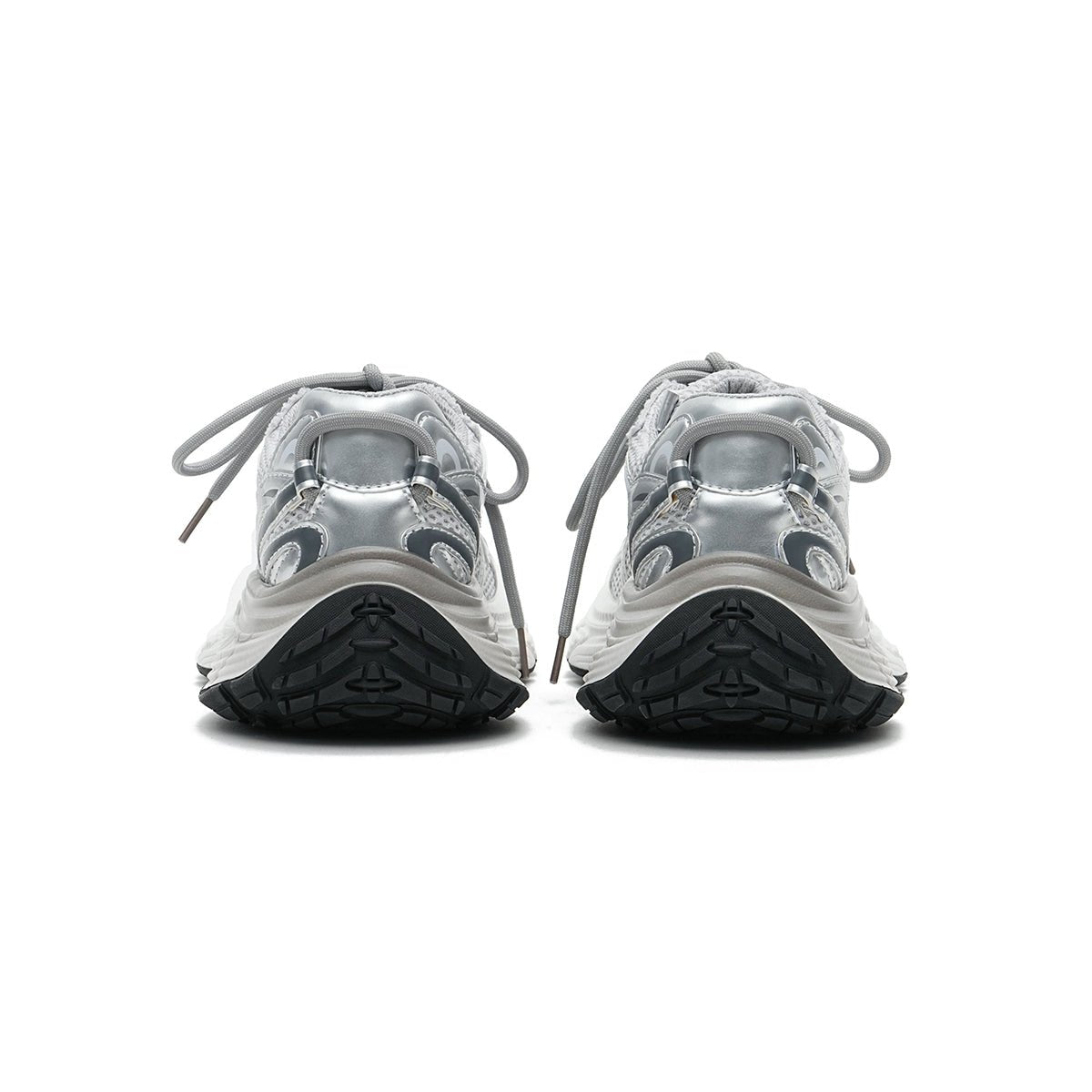 Women's chunky running shoes in metallic silver mesh with thick sculpted soles and curved lines — view 4