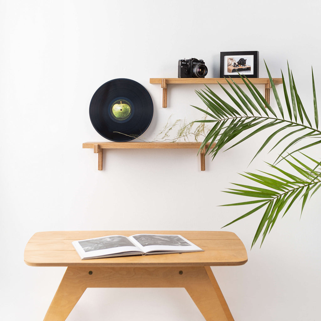 Two natural oak wood floating wall shelves with minimal home decor items and plants — view 4