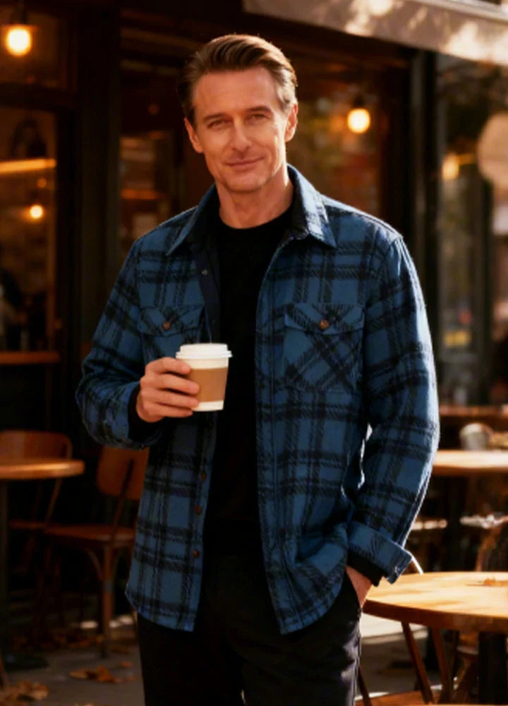 Men's sherpa lined plaid shacket in fleece material with button down front and chest pockets