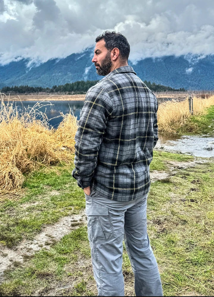 Men's sherpa lined plaid flannel shirt jacket with full zip closure and chest pockets