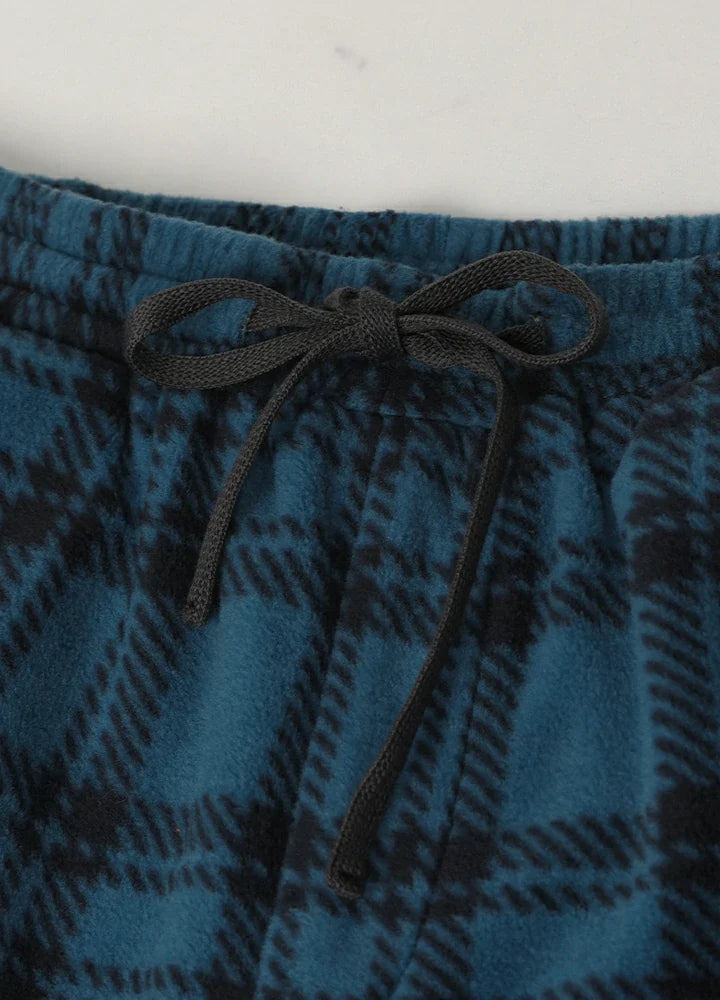 Men's plush fleece plaid pajama pants with an adjustable drawstring waist and practical front pockets — view 4