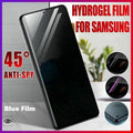 Hydrogel blue light screen protector film applied to a Samsung smartphone display with cleaning kit.