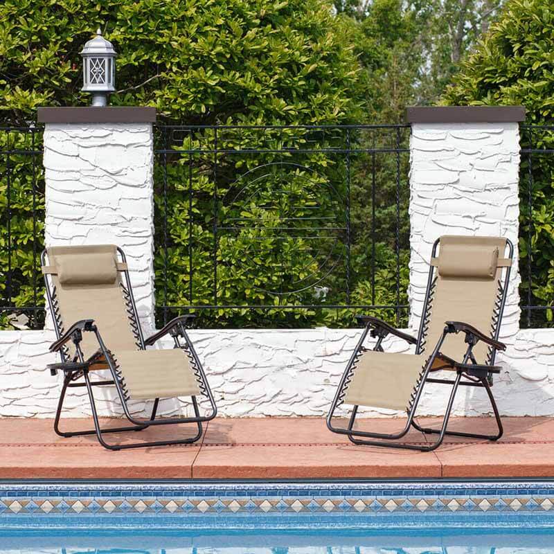 Two beige zero gravity garden chairs with attachable cup holders on a patio — view 4