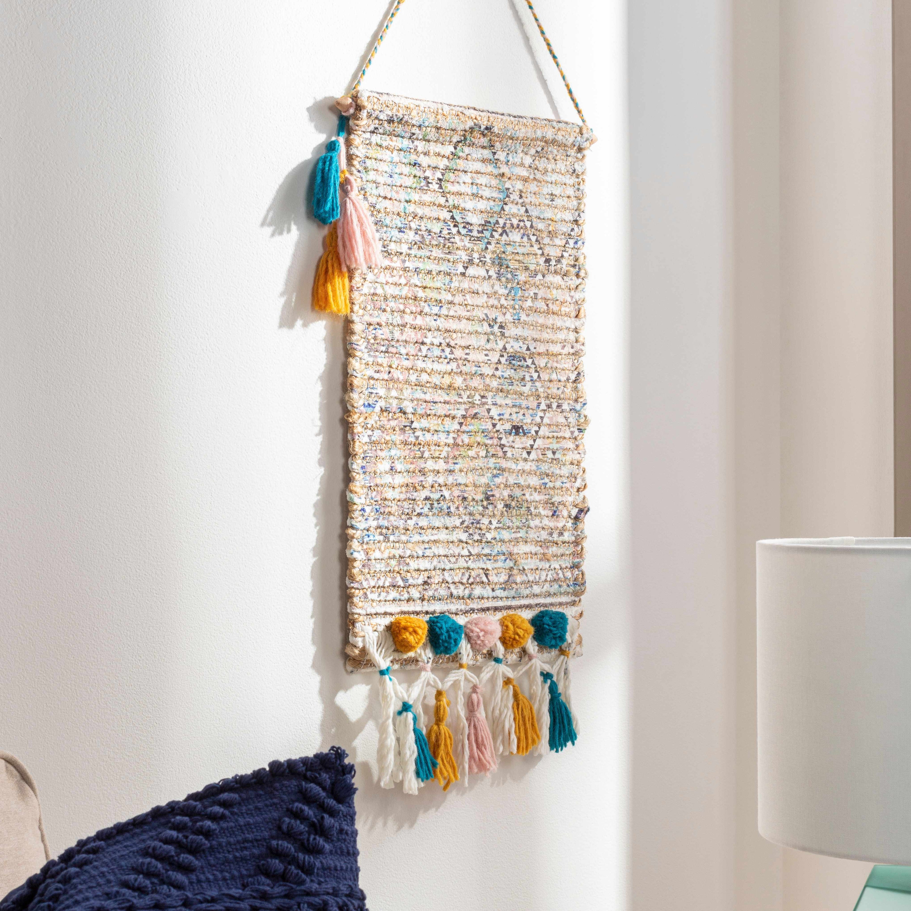 Multicolor hand woven bohemian jute wall hanging tapestry displayed on a sturdy wooden rod — view 3