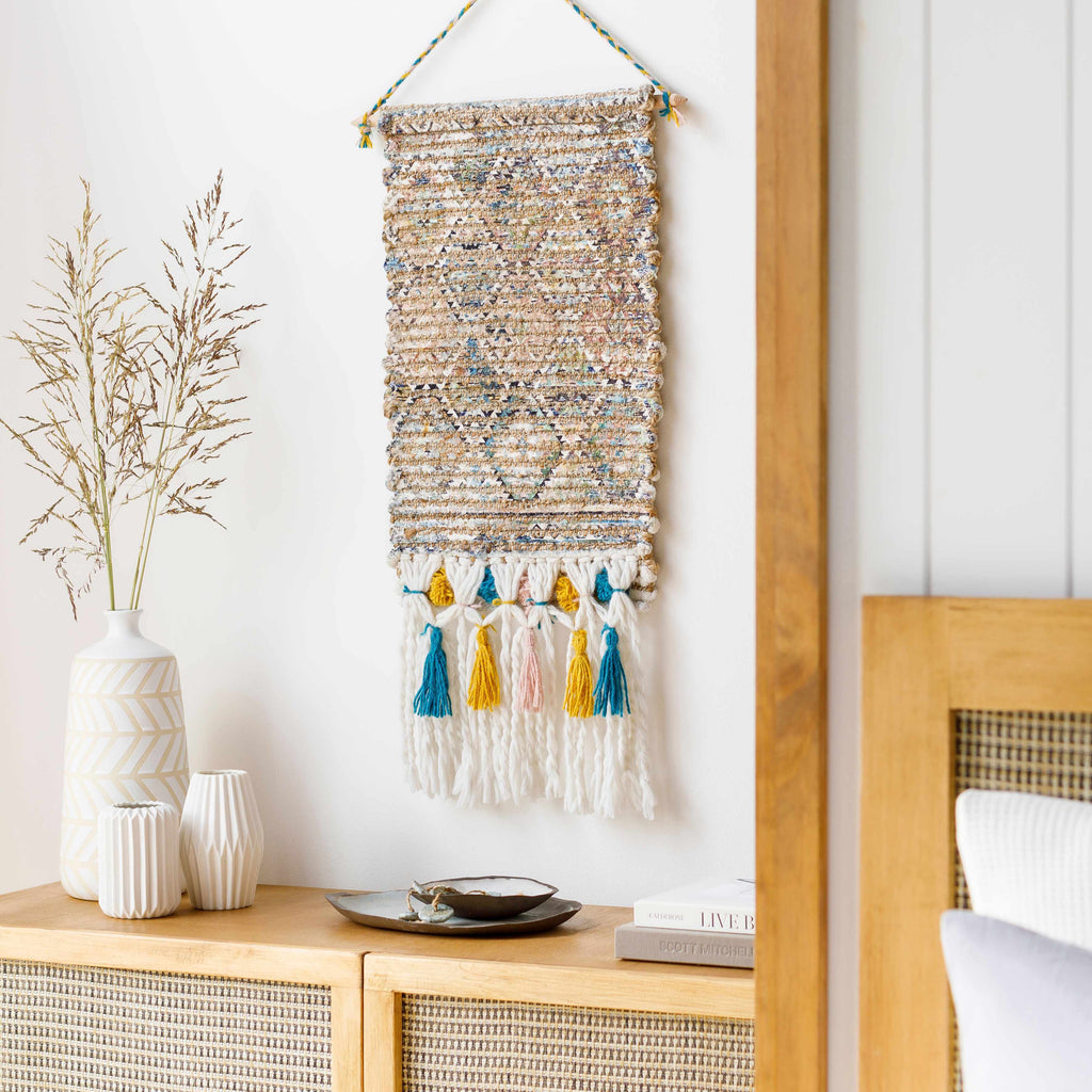 Multicolor hand woven bohemian jute wall hanging tapestry displayed on a sturdy wooden rod — view 2